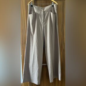 Wide Leg Tan Trousers with subtle Pin Stripes.